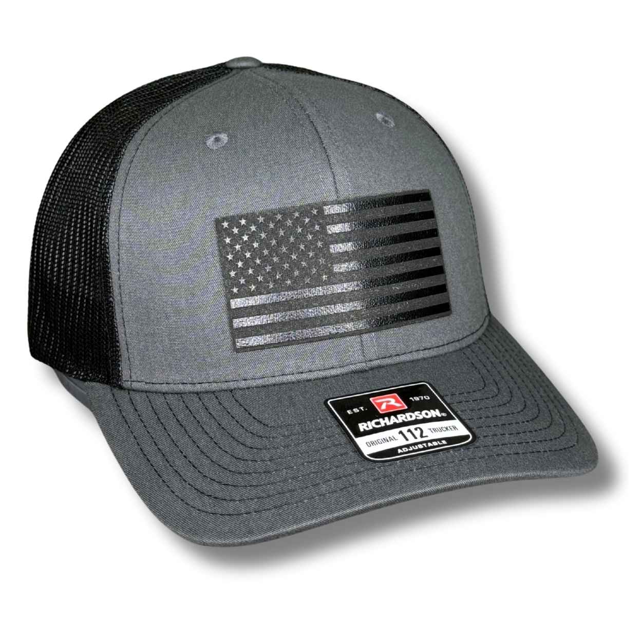 Blackout American Flag snapback hat with laser engraved leatherette patch on Richardson 112 trucker hat