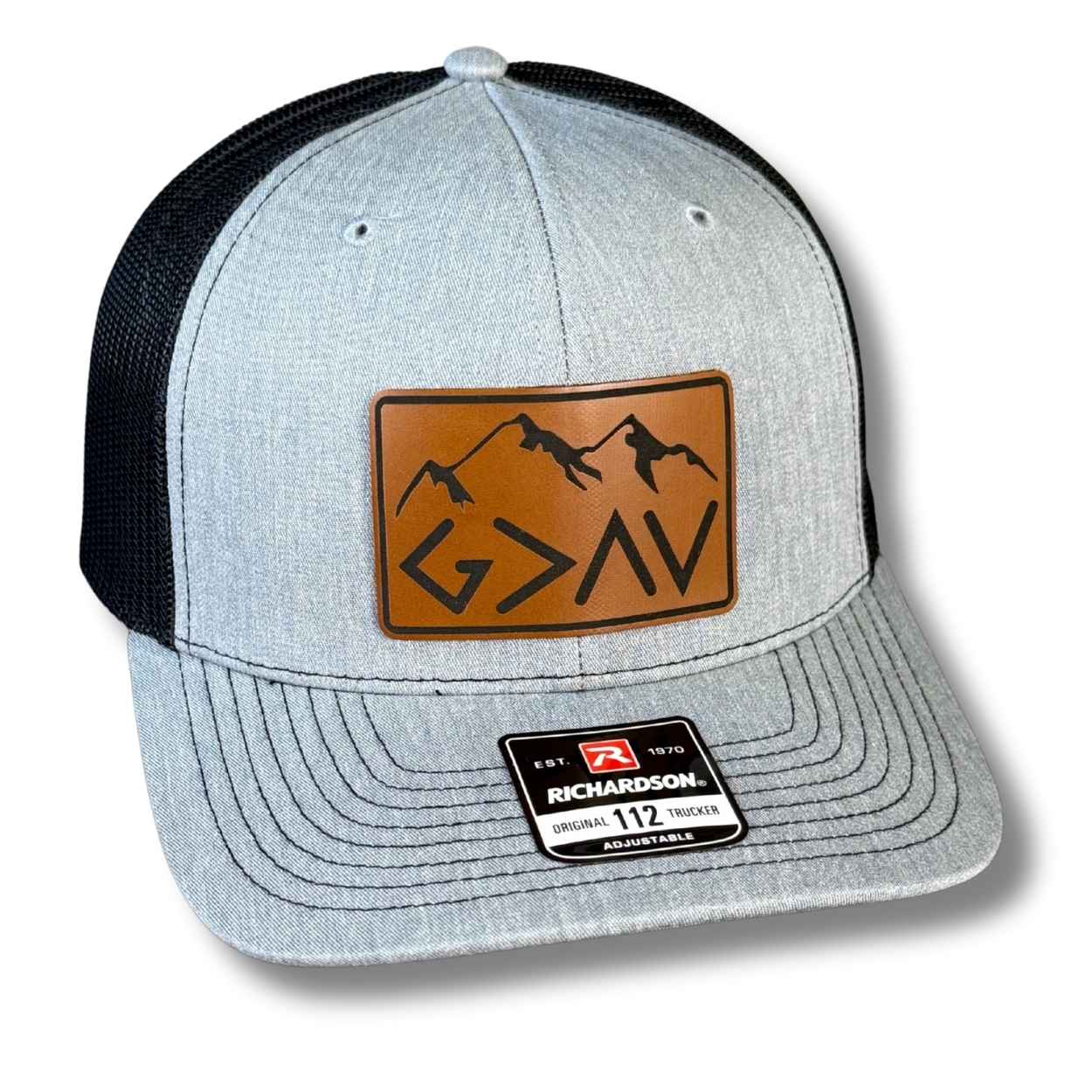 God Is Greater Than the Highs and Lows snapback hat with laser engraved leatherette patch on Richardson 112 trucker hat
